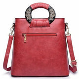 Floral Embossed Leather Shoulder Bag