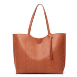 Fashion wave snake pattern handbag