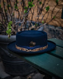 Dark blue feather fedora